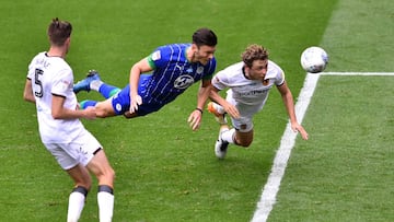 WIGAN, ENGLAND - JULY 14: Kieffer Moore of Wigan Athletic scores his team&#039;s fourth goal during the Sky Bet Championship match between Wigan Athletic and Hull City at DW Stadium on July 14, 2020 in Wigan, England. (Photo by Nathan Stirk/Getty Images) 