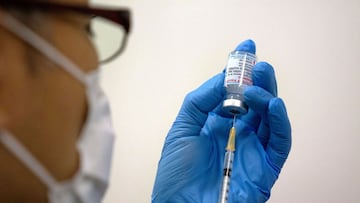 Medical staff prepares Moderna coronavirus vaccine to be administered at the newly-opened mass vaccination centre in Tokyo, Japan. 