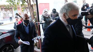 Former head of Argentina's Federal Intelligence Agency (AFI), Gustavo Arribas, arrives at a courthouse next to his lawyer, Alejandro Perez Chada, to testify under investigation for illegal espionage on politicians and journalists, during the former Argentina's President Mauricio Macri (2015-2019) administration, in Lomas de Zamora, on the outskirts of Buenos Aires, Argentina July 14, 2020. REUTERS/Agustin Marcarian
