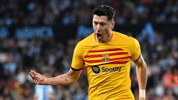 Barcelona's Polish forward #09 Robert Lewandowski celebrates scoring his team's first goal during the Spanish league football match between RC Celta de Vigo and FC Barcelona at the Balaidos stadium in Vigo on February 17, 2024. (Photo by MIGUEL RIOPA / AFP)