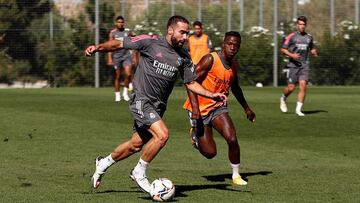 Carvajal y Vinicius, en una acción del entrenamiento de este martes en Valdebebas.