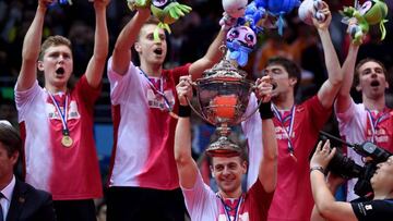 Hans-Kristian Vittinghus of Denmark holds the trophy. 