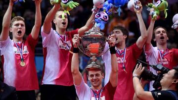 Hans-Kristian Vittinghus of Denmark holds the trophy. 