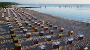 04 July 2022, Schleswig-Holstein, Timmendorfer Strand: Beach chairs stand in neat rows on a stretch of beach at Timmendorfer Strand (shot with a drone). The summer vacations have begun in Schleswig-Holstein and Mecklenburg-Western Pomerania. Photo: Christian Charisius/dpa (Photo by Christian Charisius/picture alliance via Getty Images)