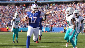 ORCHARD PARK, NEW YORK - OCTOBER 01: Josh Allen #17 of the Buffalo Bills runs the ball for a touchdown against the Miami Dolphins during the fourth quarter at Highmark Stadium on October 01, 2023 in Orchard Park, New York.   Timothy T Ludwig/Getty Images/AFP (Photo by Timothy T Ludwig / GETTY IMAGES NORTH AMERICA / Getty Images via AFP)