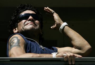 Diego Armando Maradona supporting Boca Juniors at La Bombonera.