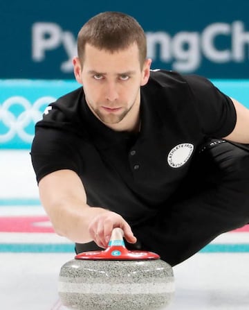 Aleksandr Krushelnitckii of the Olympic Athlete from Russia (OAR) delivers a stone during training session at the Gangneung Curling Centre at the PyeongChang 2018 Olympic Games, South Korea