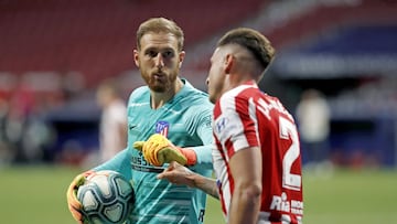 Jan Oblak y José María Giménez.