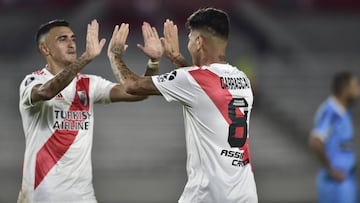 Jorge Carrascal of Argentina&#039;s River Plate, right, celebrates scoring his side&#039;s third goal against Peru&#039;s Binacional, with the teammate Matias Suarez during a Copa Libertadores Group D soccer match at the Antonio Vespucio Liberti stadium i