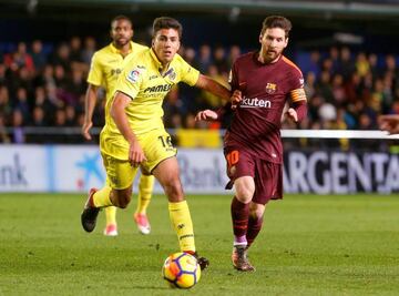 Rodri y Messi durante un partido entre el Barcelona y el Villarreal.