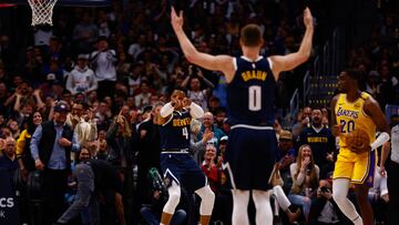 DENVER, CO - MARCH 14: Russell Westbrook #4 of the Denver Nuggets celebrates with Christian Braun #0 after scoring as Shake Milton #20 of the Los Angeles Lakers looks on during the first quarter at Ball Arena on March 14, 2025 in Denver, Colorado. NOTE TO USER: User expressly acknowledges and agrees that, by downloading and or using this photograph, User is consenting to the terms and conditions of the Getty Images License Agreement. Justin Edmonds/Getty Images/AFP (Photo by Justin Edmonds / GETTY IMAGES NORTH AMERICA / Getty Images via AFP)