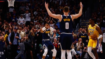 DENVER, CO - MARCH 14: Russell Westbrook #4 of the Denver Nuggets celebrates with Christian Braun #0 after scoring as Shake Milton #20 of the Los Angeles Lakers looks on during the first quarter at Ball Arena on March 14, 2025 in Denver, Colorado. NOTE TO USER: User expressly acknowledges and agrees that, by downloading and or using this photograph, User is consenting to the terms and conditions of the Getty Images License Agreement. Justin Edmonds/Getty Images/AFP (Photo by Justin Edmonds / GETTY IMAGES NORTH AMERICA / Getty Images via AFP)