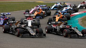 Formula One F1 - Chinese Grand Prix - Shanghai International Circuit, Shanghai, China - April 14, 2019 Haas' Romain Grosjean and Haas' Kevin Magnussen in action at the start of the race REUTERS/Thomas Peter