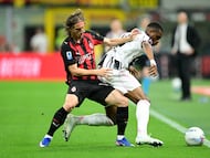Soccer Football - Serie A - AC Milan v Juventus - San Siro, Milan, Italy - April 26, 2026 AC Milan's Luka Modric in action with Juventus' Pierre Kalulu REUTERS/Daniele Mascolo
