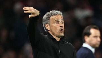 Paris Saint-Germain's Spanish headcoach Luis Enrique gestures during the French Cup (Coupe de France) semi final football match between Paris Saint-Germain (PSG) and Stade Rennais FC at the Parc des Princes stadium in Paris on April 3, 2024. (Photo by Anne-Christine POUJOULAT / AFP)