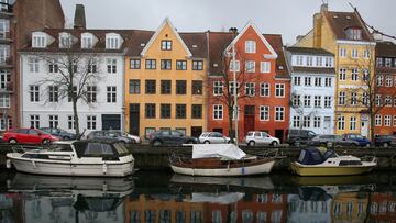 Buildings are reflected in the water along the Christianshavn Canal in Copenhagen, Denmark, January 26, 2025. REUTERS/ Tom Little