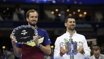 Novak Djokovic of Serbia (R) and Daniil Medvedev of Russia