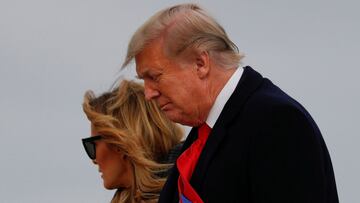 U.S. President Donald Trump and first lady Melania Trump descend from Air Force One at Joint Base Andrews in Maryland, U.S., December 31, 2020. REUTERS/Tom Brenner     TPX IMAGES OF THE DAY