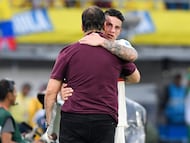 BARRANQUILLA, COLOMBIA - OCTOBER 15: James Rodriguez of Colombia hugs Nestor Lorenzo, Head Coach of Colombia in a substitution during the FIFA World Cup 2026 South American Qualifier match between Colombia and Chile at Roberto Melendez Metropolitan Stadium on October 15, 2024 in Barranquilla, Colombia. (Photo by Gabriel Aponte/Getty Images)
