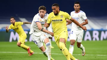 MADRID, SPAIN - SEPTEMBER 25: Arnaut Danjuma of Villarreal CF battles for possession with Federico Valverde of Real Madrid during the La Liga Santander match between Real Madrid CF and Villarreal CF at Estadio Santiago Bernabeu on September 25, 2021 in Madrid, Spain. (Photo by Denis Doyle/Getty Images)
PUBLICADA 26/09/21 NA MA04 2COL