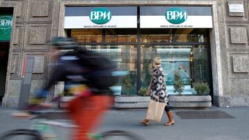 FILE PHOTO: A woman walks in front of a Banco BPM bank in Milan, Italy, January 29, 2016. REUTERS/Alessandro Garofalo/File Photo