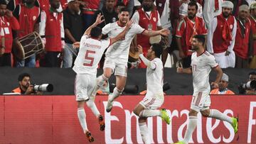Iran's midfielder Alireza Jahanbakhsh (2nd-L) celebrates his opening goal during the 2019 AFC Asian Cup Round of 16 football match between Iran and Oman at the Mohammed Bin Zayed Stadium in Abu Dhabi on January 20, 2019. (Photo by Khaled DESOUKI / AF