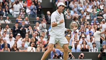 Chile's Nicolas Jarry reacts as he plays against Britain's Cameron Norrie during their men's singles fourth round tennis match on the seventh day of the 2025 Wimbledon Championships at The All England Lawn Tennis and Croquet Club in Wimbledon, southwest London, on July 6, 2025. (Photo by Glyn KIRK / AFP) / RESTRICTED TO EDITORIAL USE