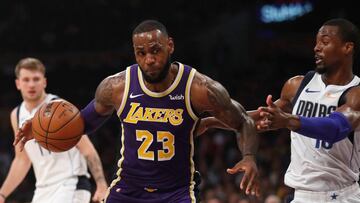 LOS ANGELES, CA - OCTOBER 31: LeBron James #23 of the Los Angeles Lakers dribbles into the defense of Harrison Barnes #40 of the Dallas Mavericks during the second half of a game at Staples Center on October 31, 2018 in Los Angeles, California. NOTE TO USER: User expressly acknowledges and agrees that, by downloading and or using this photograph, User is consenting to the terms and conditions of the Getty Images License Agreement.   Sean M. Haffey/Getty Images/AFP
 == FOR NEWSPAPERS, INTERNET, TELCOS &amp; TELEVISION USE ONLY ==