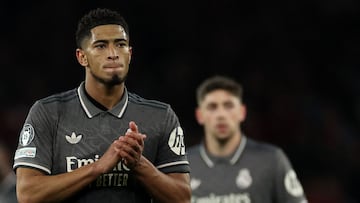 Real Madrid's English midfielder #05 Jude Bellingham reacts after the UEFA Champions League Quarter final first leg football match between Arsenal and Real Madrid, at the Emirates Stadium, in London, on April 8, 2025. (Photo by Adrian Dennis / AFP)