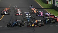 George Russell of the United Kingdom drives the Mercedes alongside Max Verstappen of the Netherlands who drives the Red Bull Racing during the 2023 Formula 1 Australian Grand Prix at Albert Park in Melbourne on the 2nd of April, 2023.  (Photo by Morgan Hancock/NurPhoto via Getty Images)