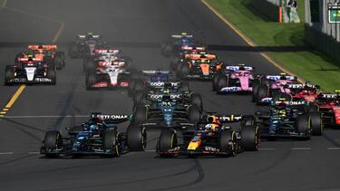 George Russell of the United Kingdom drives the Mercedes alongside Max Verstappen of the Netherlands who drives the Red Bull Racing during the 2023 Formula 1 Australian Grand Prix at Albert Park in Melbourne on the 2nd of April, 2023. (Photo by Morgan Hancock/NurPhoto via Getty Images)