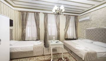 Habitaci¨®n familiar del Hotel Alhambra Apart