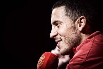 Eden Hazard smiles during a press conference in Tubize.