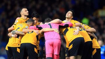Wolves players prepare for the English Premier League football match between Everton and Wolverhampton Wanderers at Goodison Park in Liverpool, north west England on March 13, 2022. (Photo by Lindsey Parnaby / AFP) / RESTRICTED TO EDITORIAL USE. No use wi