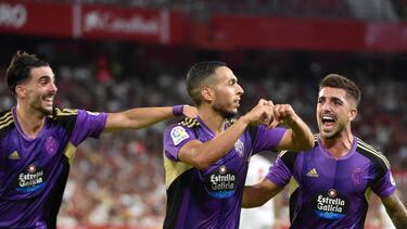Real Valladolid's Moroccan midfielder Anuar Mohamed (C) celebrates scoring the opening goal during the Spanish League football match between Sevilla FC and Real Valladolid FC at the Ramon Sanchez Pizjuan stadium in Seville on August 19, 2022. (Photo by CRISTINA QUICLER / AFP) (Photo by CRISTINA QUICLER/AFP via Getty Images)