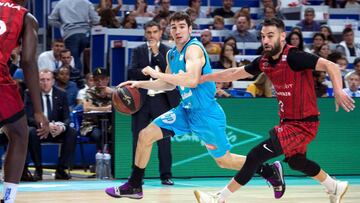 GRAF1497. MADRID, 07/10/2018.- El escolta del Movistar Estudiantes Darío Brizuela (i) supera al escolta croata del Montakit Fuenlabrada, Marko Popovic, en partido de la tercera jornada de la liga ACB de baloncesto que se disputa esta mañana