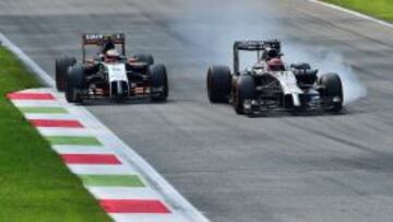 P&eacute;rez y Button durante su bonito duelo en Monza.