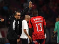 Independiente Medellin's coach Alejandro Restrepo (L) gives instructions to midfielder #13 Francisco Chaverra during the Copa Libertadores phase three second-leg football match between Colombia's Independiente Medellin and Uruguay's Juventud at the Atanasio Girardot Stadium in Medellin, Colombia on March 12, 2026. (Photo by Jaime SALDARRIAGA / AFP)