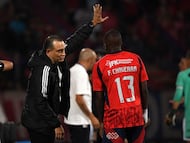 Independiente Medellin's coach Alejandro Restrepo (L) gives instructions to midfielder #13 Francisco Chaverra during the Copa Libertadores phase three second-leg football match between Colombia's Independiente Medellin and Uruguay's Juventud at the Atanasio Girardot Stadium in Medellin, Colombia on March 12, 2026. (Photo by Jaime SALDARRIAGA / AFP)