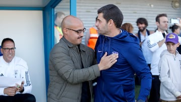 Saludo entre Víctor Martín y Manolo Cano.
