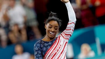Paris (France), 30/07/2024.- Simone Biles of the USA reacts during the Women Team final of the Artistic Gymnastics competitions in the Paris 2024 Olympic Games, at the Bercy Arena in Paris, France, 30 July August 2024. (Francia) EFE/EPA/CAROLINE BREHMAN