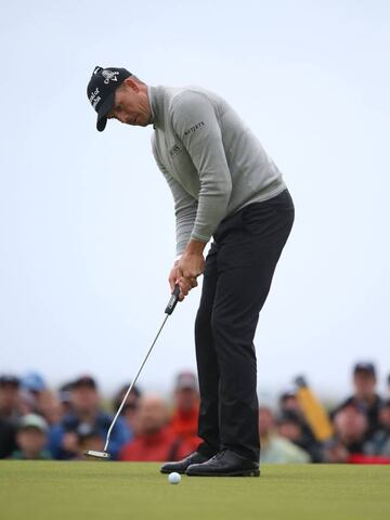 Stenson holes his birdie putt on the 17th green during the third roun.
