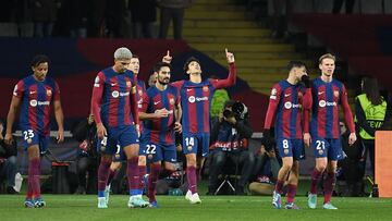 Barcelona's Portuguese forward #14 Joao Felix celebrates with teammates after scoring his team's second goal during the UEFA Champions League first round group H football match between FC Barcelona and FC Porto at the Estadi Olimpic Lluis Companys in Barcelona on November 28, 2023. (Photo by Josep LAGO / AFP)