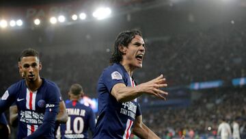 PSG&#039;s Edinson Cavani, right, celebrates after his teammate Marquinhos scores against Bordeaux during the French League One soccer match between Paris-Saint-Germain and Bordeaux at the Parc des Princes stadium in Paris, Sunday Feb. 23, 2020. (AP Photo