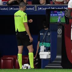 Who is Javier Iglesias Villanueva, referee for the Barcelona vs Osasuna game in LaLiga Santander?