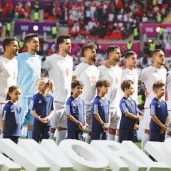 Why aren’t Iran players singing the national anthem before games at the World Cup?