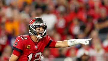 TAMPA, FLORIDA - OCTOBER 27: Tom Brady #12 of the Tampa Bay Buccaneers signals at the line of scrimmage against the Baltimore Ravens during the fourth quarter at Raymond James Stadium on October 27, 2022 in Tampa, Florida.   Mike Ehrmann/Getty Images/AFP