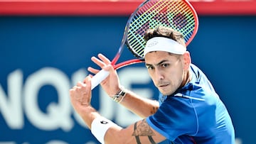 MONTREAL, CANADA - AUGUST 10: Alejandro Tabilo of Chile gets into position for a backhand against Jannik Sinner