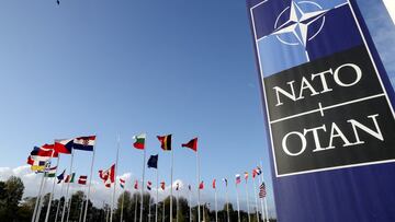 FILE PHOTO: FILE PHOTO: Flags wave outside the Alliance headquarters ahead of a NATO Defence Ministers meeting, in Brussels, Belgium, October 21, 2021. REUTERS/Pascal Rossignol/File Photo/File Photo