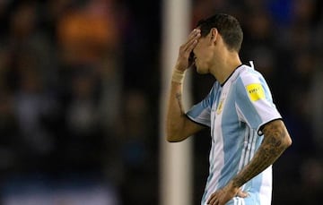 Argentina's Angel Di Maria gestures after getting injured during their 2018 World Cup qualifier football match against Venezuela in Buenos Aires, on September 5, 2017.